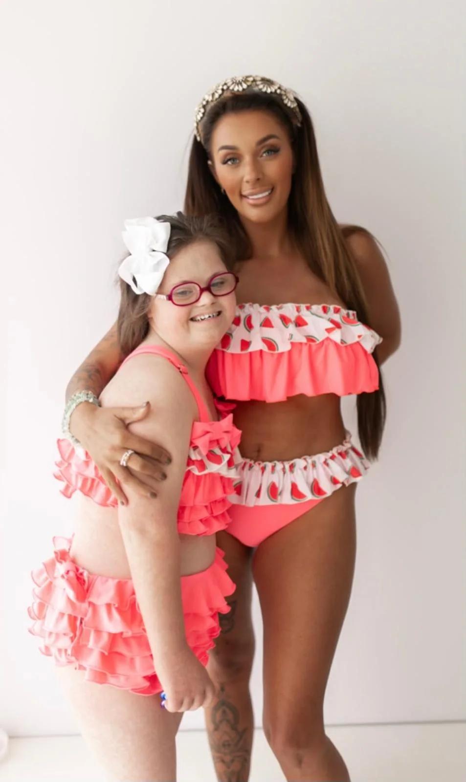 Two Fruity & Frilly models matching in our watermelon ruffle swimwear